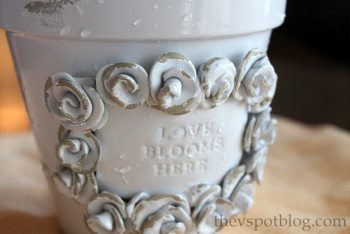 Make weathered, shabby chic flower pots using spray paint & candle wax.