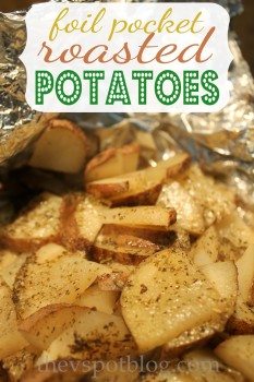 Roasting cheesy herb potatoes in foil packets.