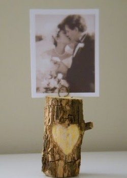 A cute and rustic branch photo holder.