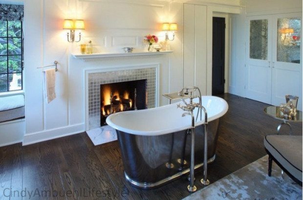 Grand bathroom with freestanding tub and fireplace